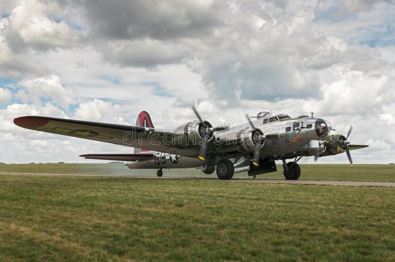 EDEN PRAIRIE, MN - JULY 16 2016: B-17G bomber Yankee Lady starts up engines for takeoff at air show. This B-17 was a Flying Fortress built for use during WW II but never flew in any combat missions.