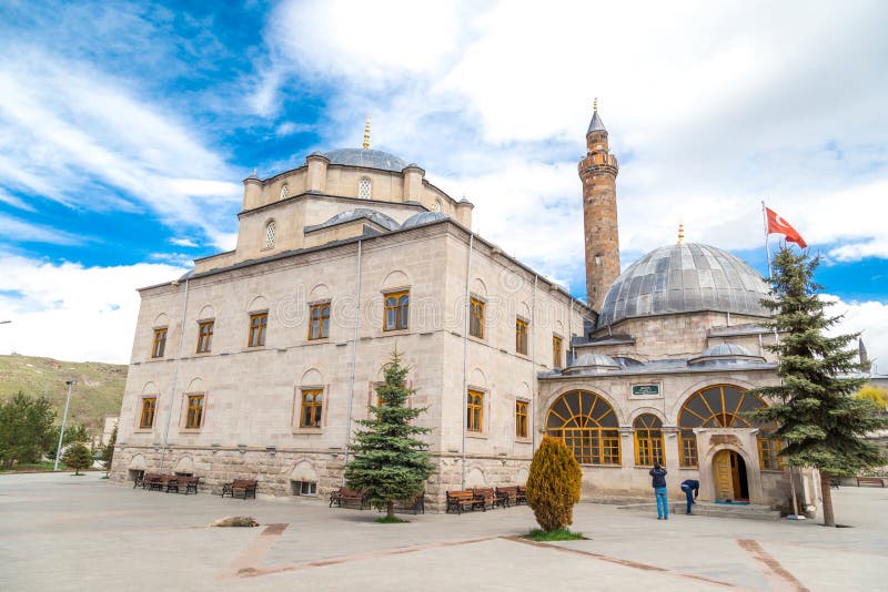 KARS, TURKEY - MAY 07, 2017 : General yard view of Evliya Mosque and Ebu`l Hasan Harakani Tomb, on cloudy sky background. It was built in 16th century. KARS, TURKEY - MAY 07, 2017 : General yard view of Evliya Mosque and Ebu`l Hasan Harakani Tomb, on cloudy sky background. It was built in 16th century.