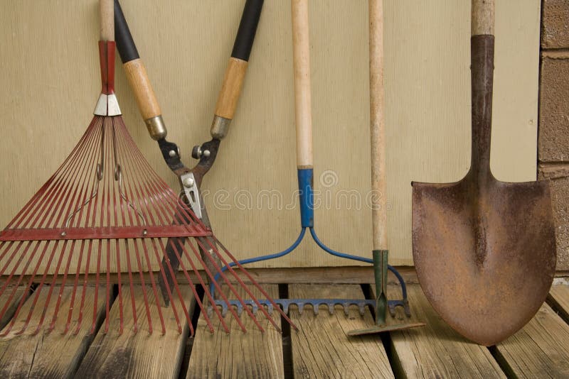 Yard and Garden Tools. A still life of various tools and equipment used in the yard and garden Yard and Garden Tools. A still life of various tools and equipment used in the yard and garden