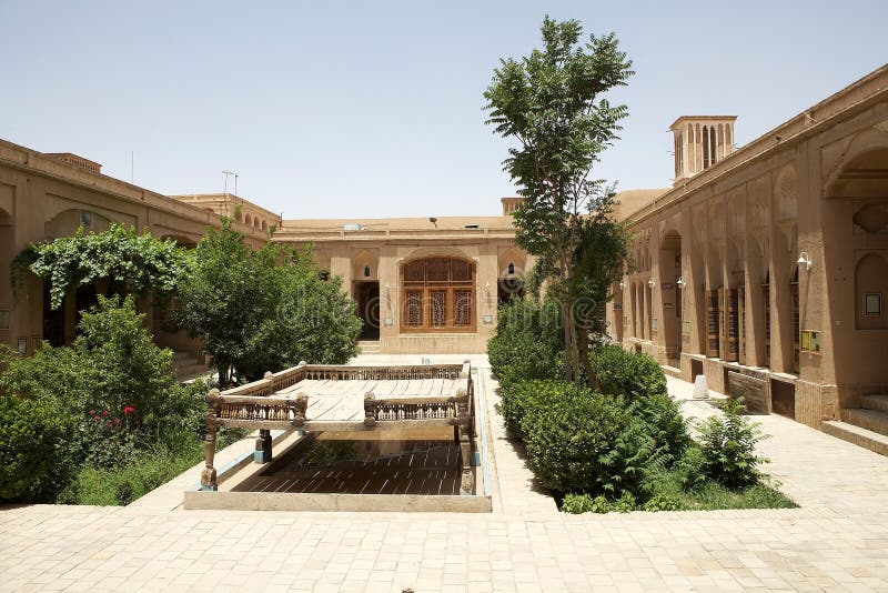 Yazd. Khan-e Lary house courtyard at Yazd, Iran. The Khan-e Lary House is the mansion of a welthy merchant family. Built in 1860 it is a fine example of Qajar royalty free stock photography Yazd. Khan-e Lary house courtyard at Yazd, Iran. The Khan-e Lary House is the mansion of a welthy merchant family. Built in 1860 it is a fine example of Qajar royalty free stock photography