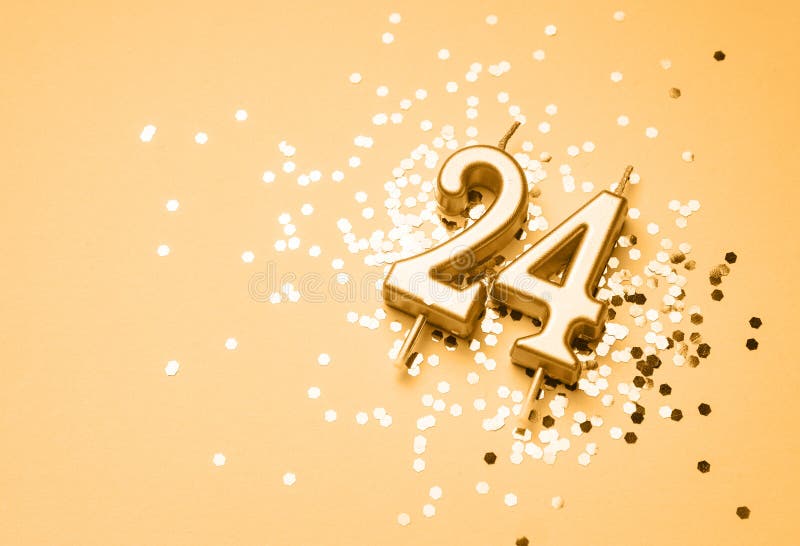24 years birthday celebration festive background made with golden candle in the form of number Twenty four