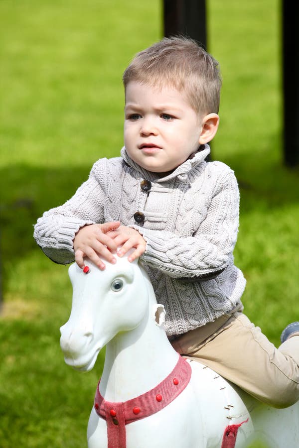 2 Years Old Baby Boy Playing with Horse Stock Image Image of enjoy