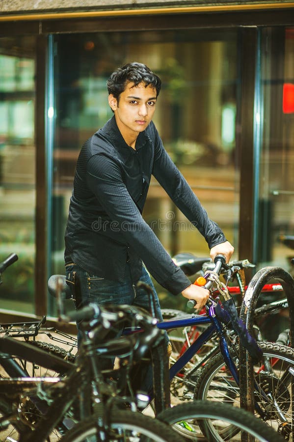 18 Years Old East Indian American Male Teenager Riding Bicycle Stock ...