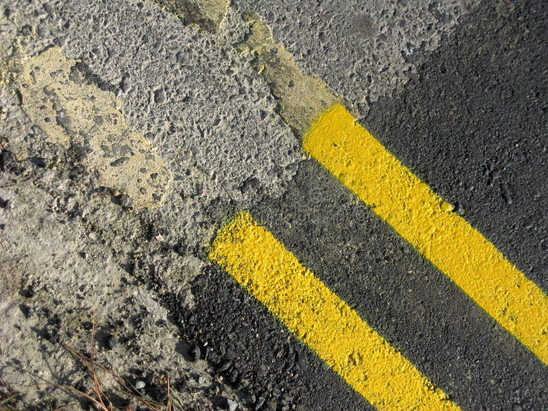 Yellow abstract road paint stock photo. Image of aslphalt 25420096