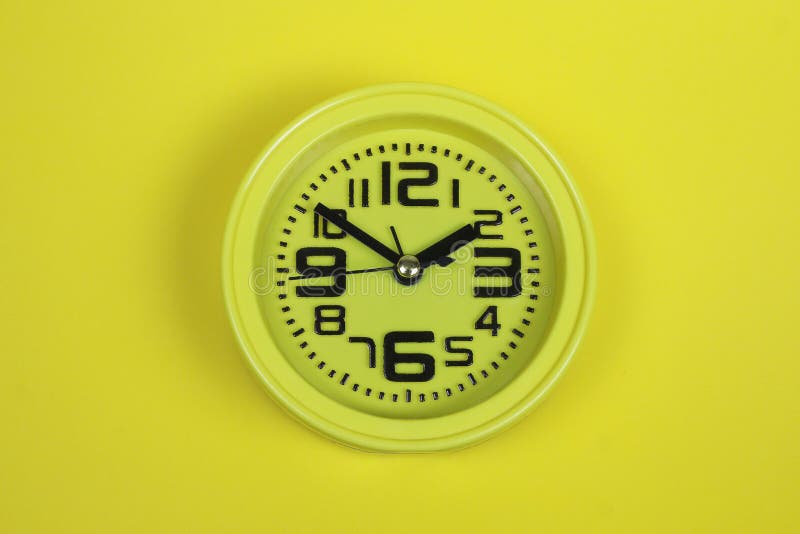 Yellow Alarm Clock On Yellow Background Stock Image Image of square, metal 168730807