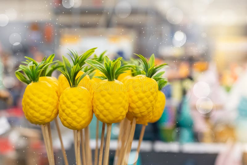 Yellow artificial pineapples for home plants decoration in Art Deco style. Yellow vivid exotic artificial pineapples for home plants decoration in Art Deco style royalty free stock photography Yellow artificial pineapples for home plants decoration in Art Deco style. Yellow vivid exotic artificial pineapples for home plants decoration in Art Deco style royalty free stock photography