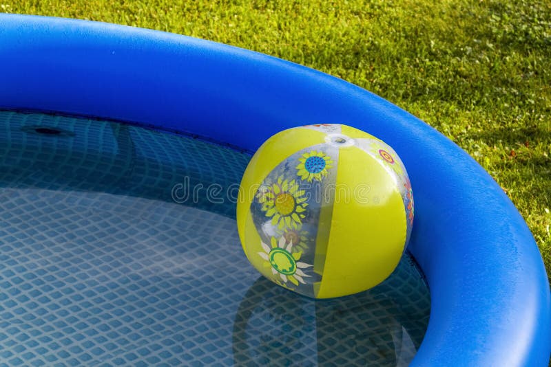 Yellow Ball in the Blue Pool Stock Photo Image of clear, reflection