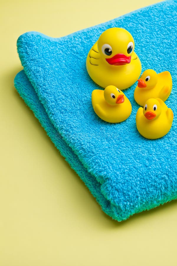 Yellow Bath Duck on Blue Towel Stock Photo Image of baby, towel 33241808