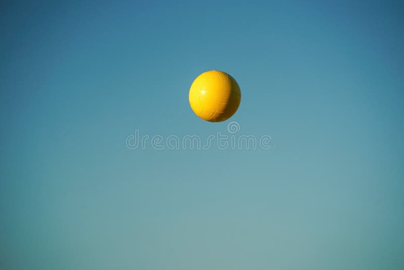 Yellow Beach Volley Ball on Blue Sky Background Stock Image Image of