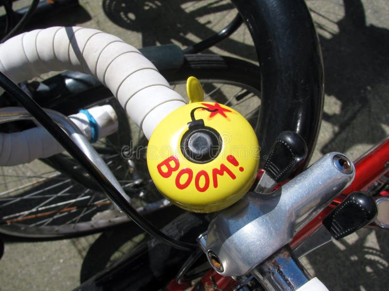 Bicycle Bell Painted Yellow with Written Word Boom Stock Image Image