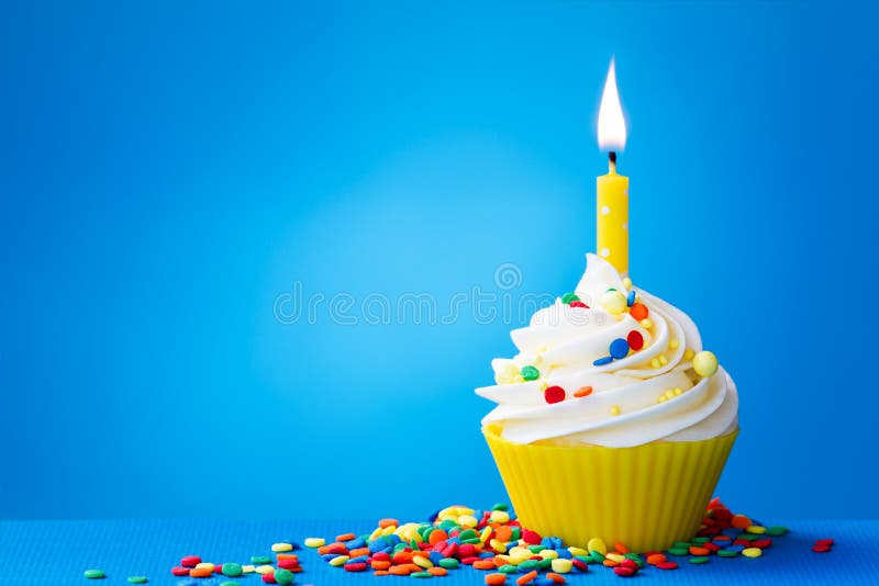 Yellow birthday cupcake stock photography Yellow birthday cupcake stock photography