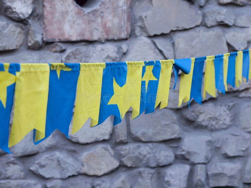 Yellow and blue flags. stock photo. Image of outdoors 56975566