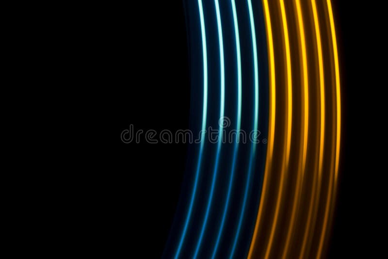 Yellow and blue light dynamics lines on a black background. Yellow and blue light dynamics lines on a black background