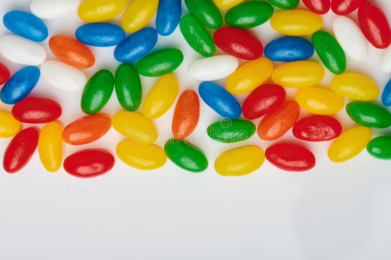 Yellow and blue oval candy stock photo. Image of color 217429698