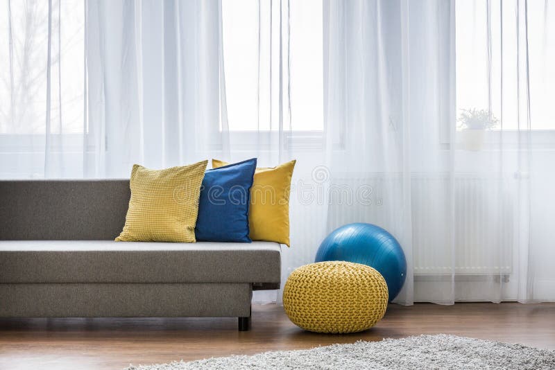 Yellow and Blue Pillows on Couch Stock Photo Image of living, sofa