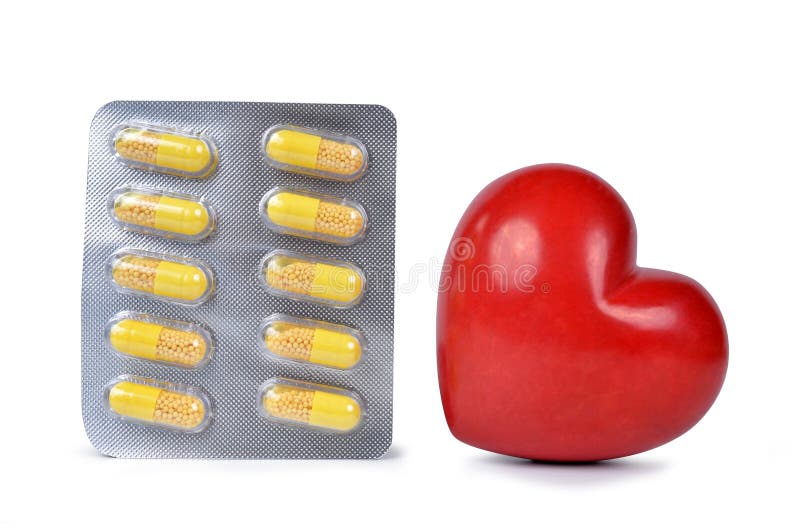 Yellow Capsule Pills with Heart Stock Photo Image of tablet, medical