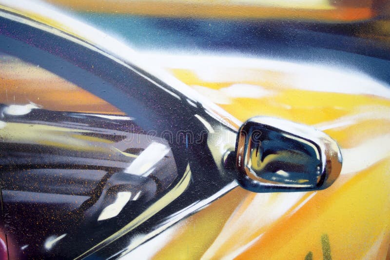 Yellow car street art, close-up mirror. High quality photo