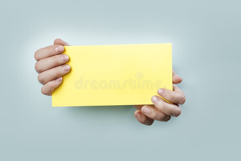 Yellow Card stock photo. Image of hold, fingers, hands 23657520
