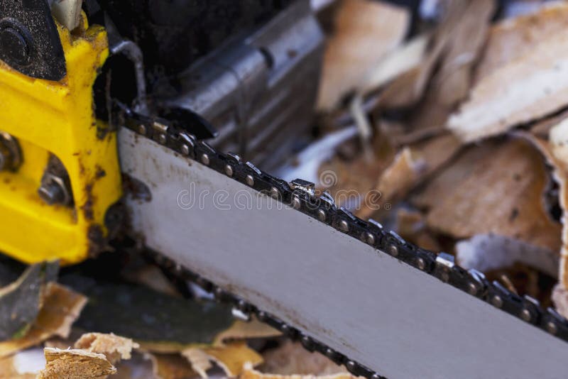 Yellow chainsaw stock photo. Image of yellow, work, white 17509412