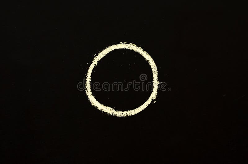 Yellow Chalk Drawn Circle on Blackboard. Stock Photo Image of