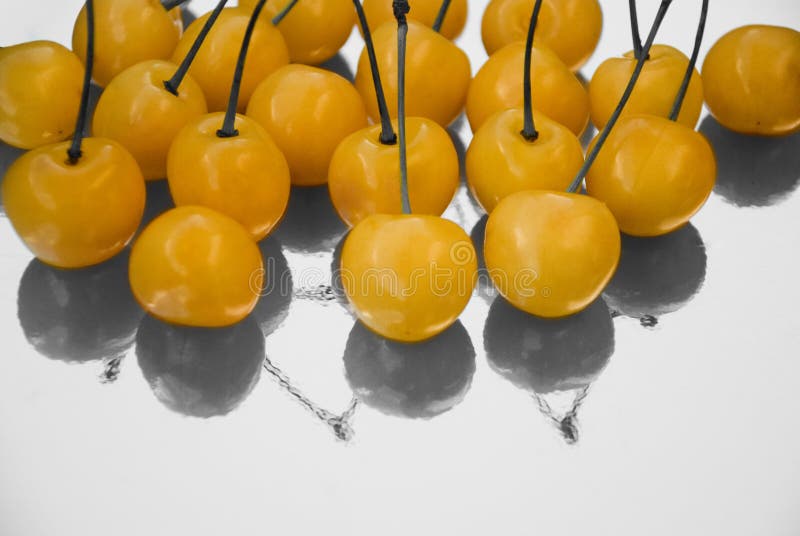 Yellow Cherries stock image. Image of natural, white 16414431