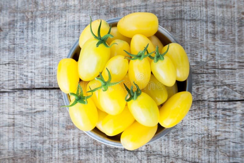 Yellow cherry tomato stock photo. Image of veggie, food 47584812