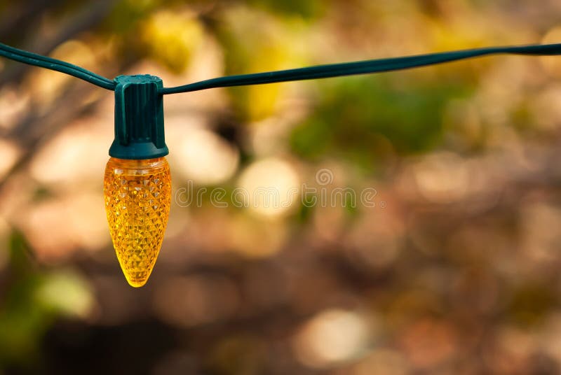 Yellow Christmas Light stock photo. Image of lighting 129190848