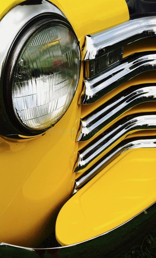 Yellow Classic Car Headlight and Partial Grill Stock Photo Image of