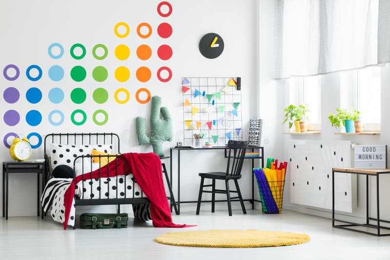 Colorful kid`s bedroom with clock