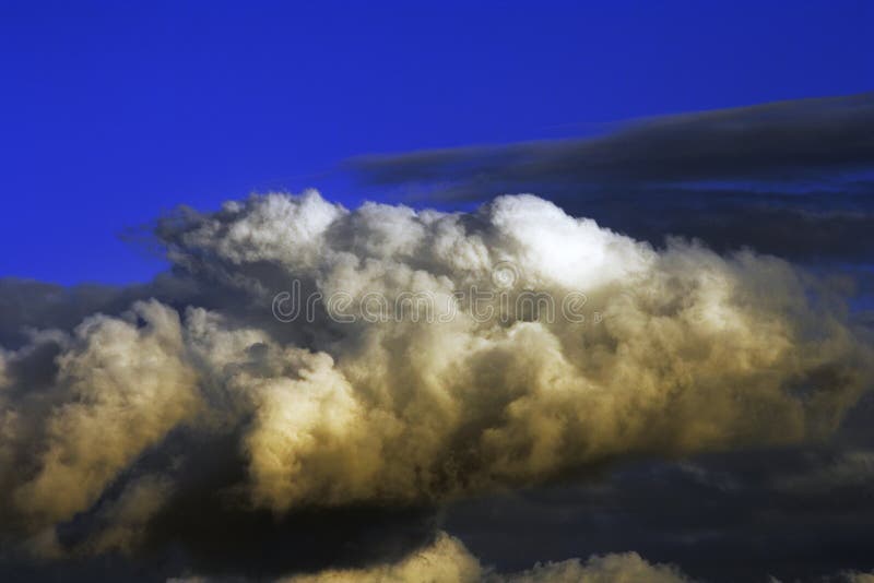 Yellow cloud stock image. Image of blue, yellow, stormy 1349715
