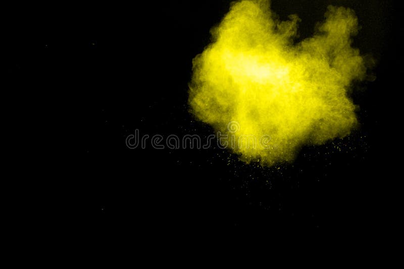 Yellow color powder explosion cloud isolated on black background royalty free stock photography Yellow color powder explosion cloud isolated on black background royalty free stock photography