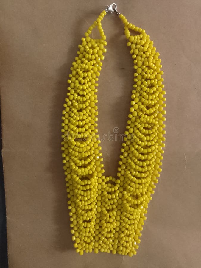 Yellow colour seed bead stock photo. Image of colour 277013844