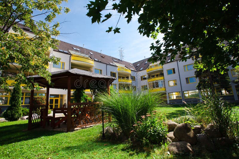 Yellow complex of residential house - Block of flats - Park in backyard
