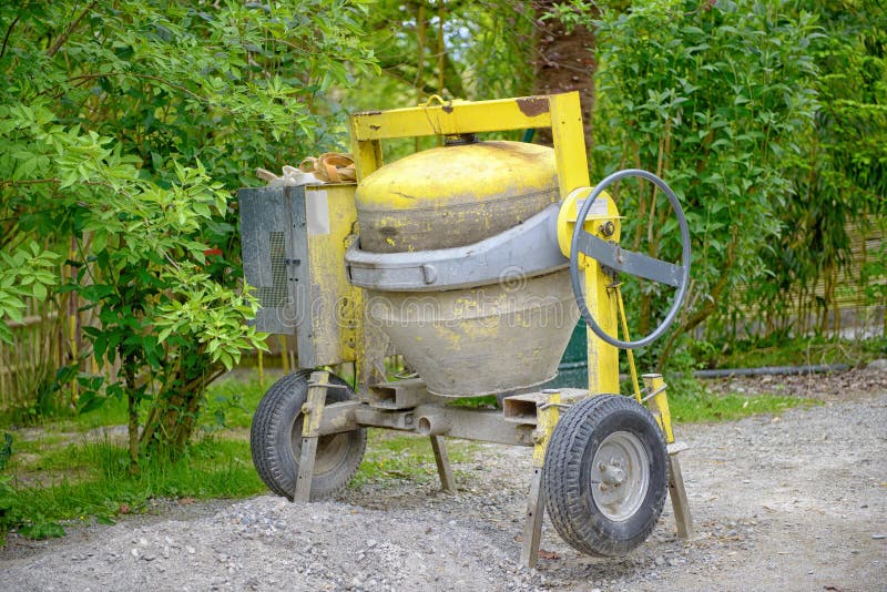 Yellow concrete mixer stock image. Image of working, steel 71882731