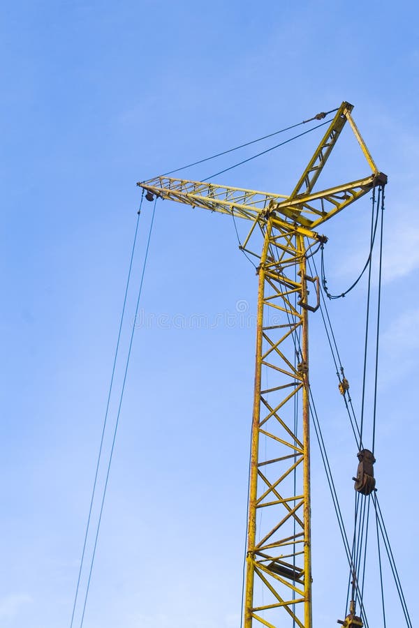 Yellow crane stock photo. Image of blue, architecture - 6975878