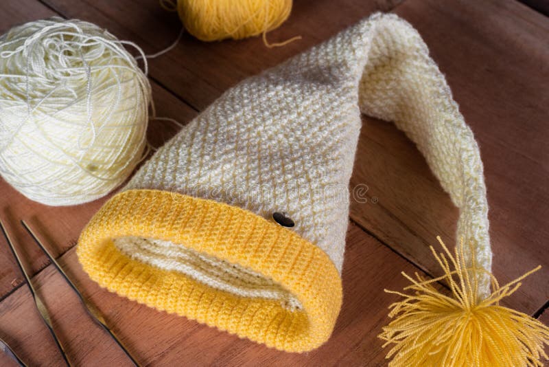 Yellow Crocheted Hat with Materials for Designing and Knitting Garments Stock Image Image of