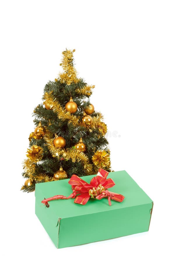Yellow Decorated Christmas Tree and Gift with Red Ribbon Stock Image