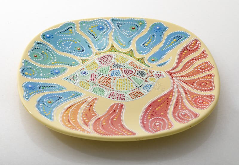 Yellow Decorative Plate for Interior Decoration Close Up Stock Photo