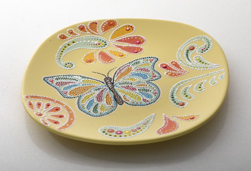 Yellow Decorative Plate for Interior Decoration Close Up Stock Photo