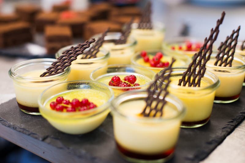 Yellow Dessert on Black Plate Stock Photo Image of berries, plate