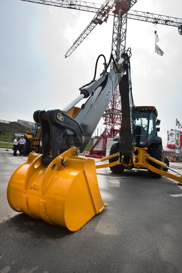 MOSCOW, RUSSIA - JUNE 02: Yellow diesel excavator on display at Moscow International exhibition Construction equipment and technologies on JUNE 02, 2010 in Moscow, Russia. Track hoe construction excavator stock images, royalty-free photos and pictures