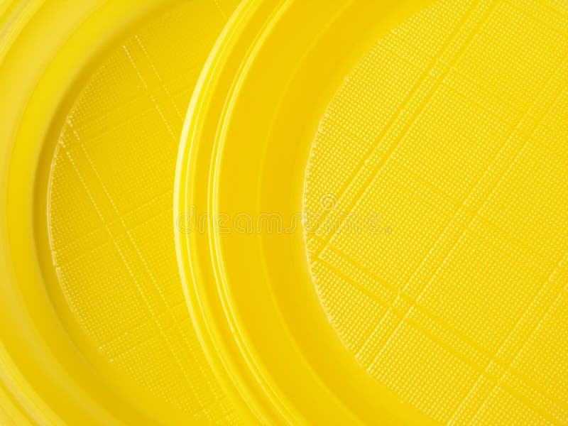 Yellow disposable dishes stock image. Image of disposable 12004515