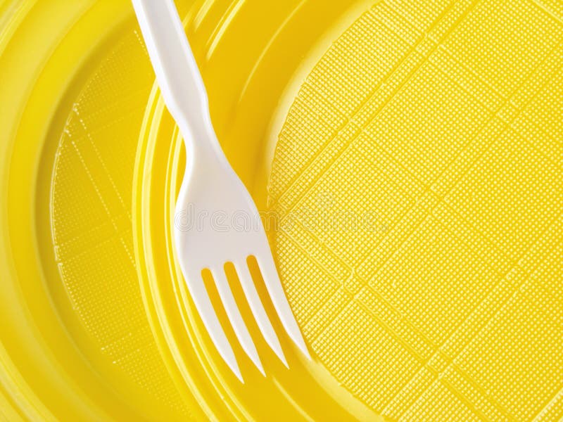 Yellow disposable plates stock image. Image of supply 12394945
