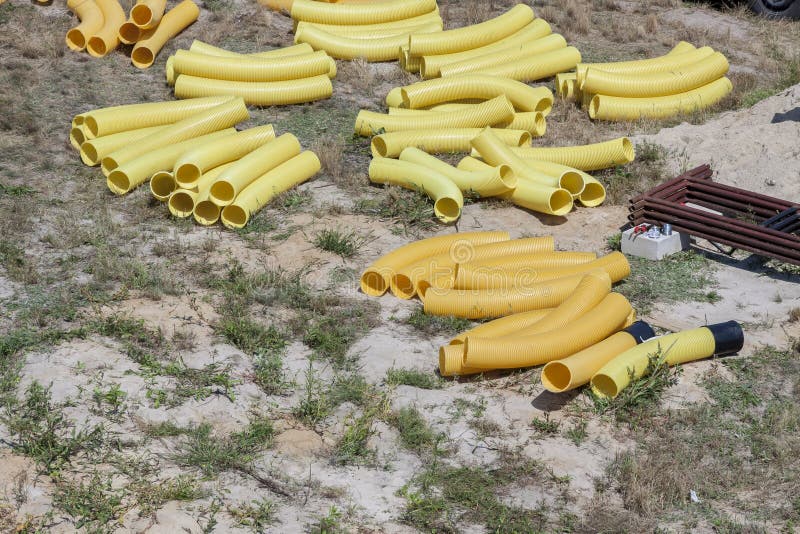 Yellow drain pipe stock photos