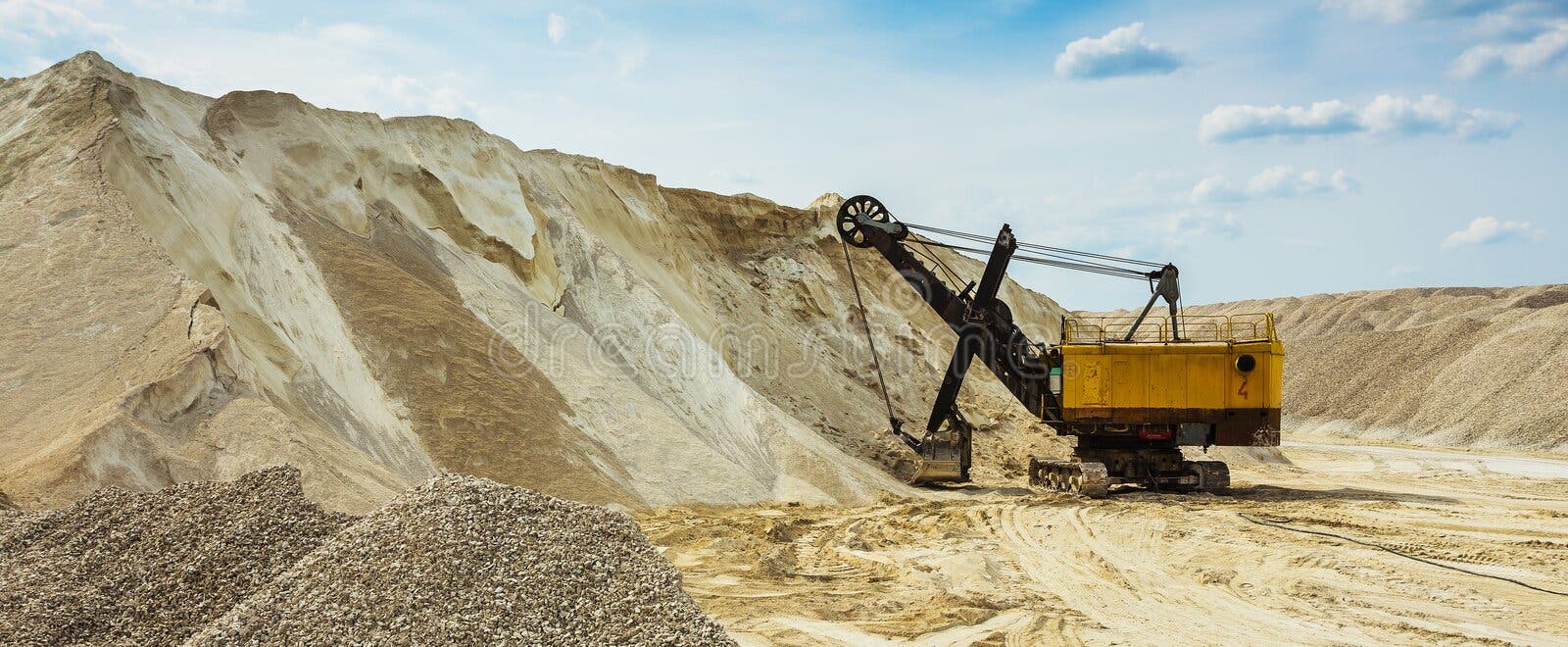 Mobile Stone Crusher Machine By The Construction Site Or Mining Quarry For  Crushing Old Concrete Slabs Into Gravel And Subsequent Cement Production.  Stock Photo, Picture and Royalty Free Image. Image 130474849.