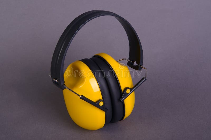 Yellow ear muffs stock photo. Image of sound, head, hearing 54276642