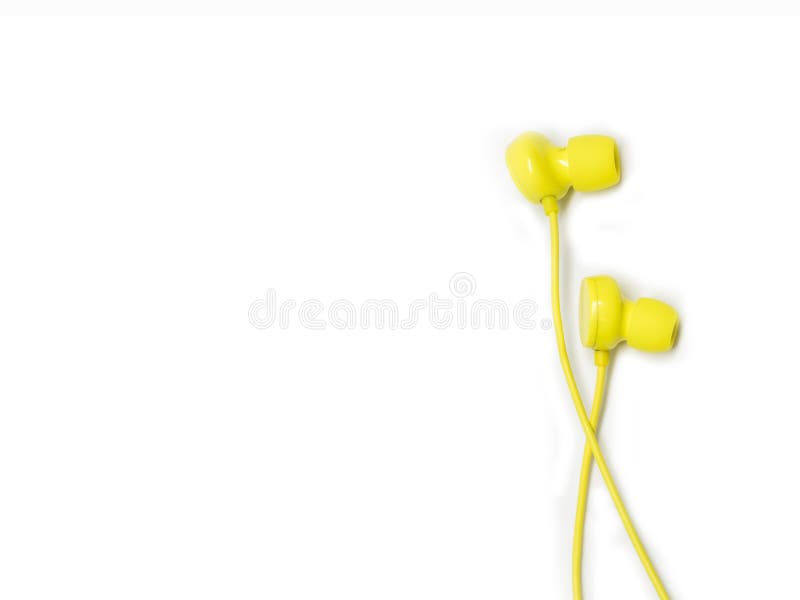 Yellow earbuds isolated on a white background, with space for text