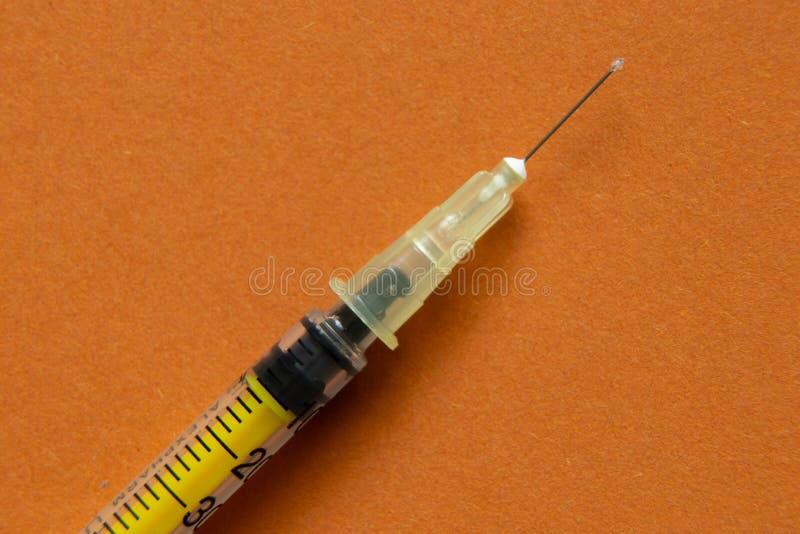 Close Up Shot Of A Pile Of Medical Insulin Needles With Orange Caps Stock  Photo - Download Image Now - iStock