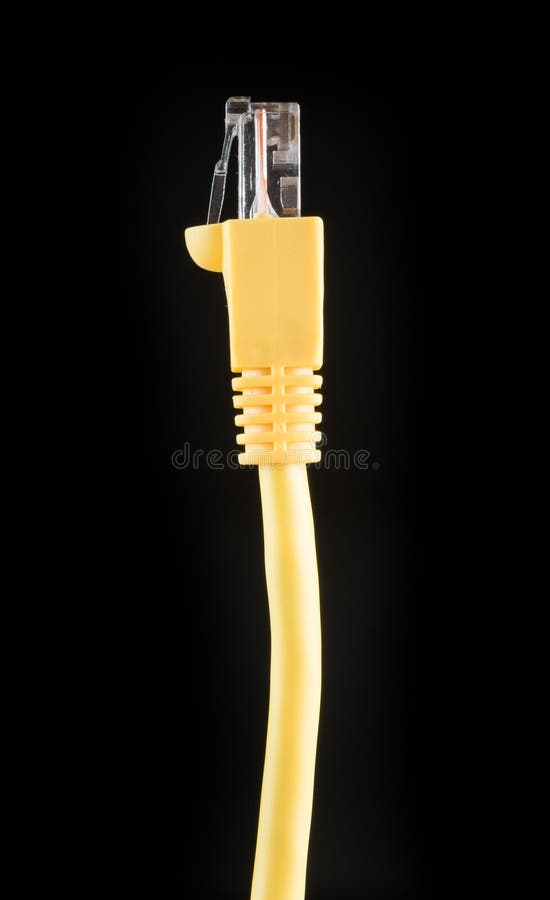 Yellow Cable Connected To Modem Router Port on a Wooden Table