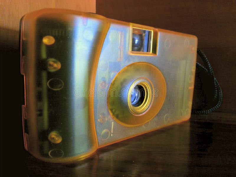 Yellow film camera editorial photo. Image of aperture 54305141